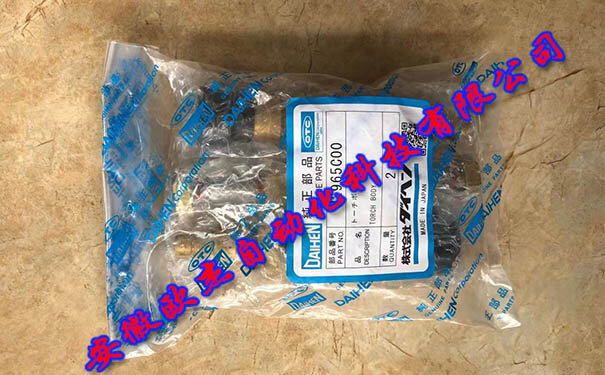 Close-up of OTC DAIHEN U2965C00 welding torch body