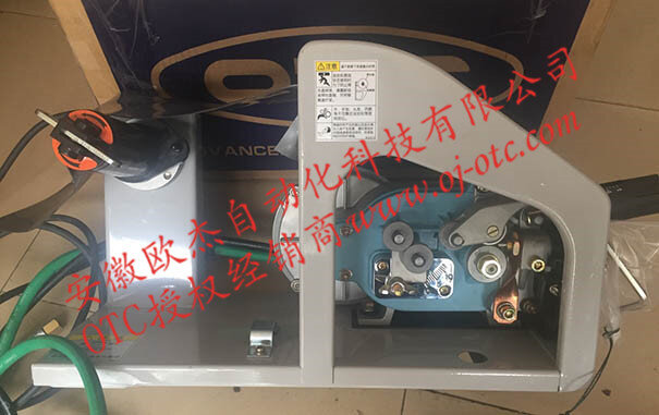 OTC DAIHEN CMXL-2301 wire feeder side view