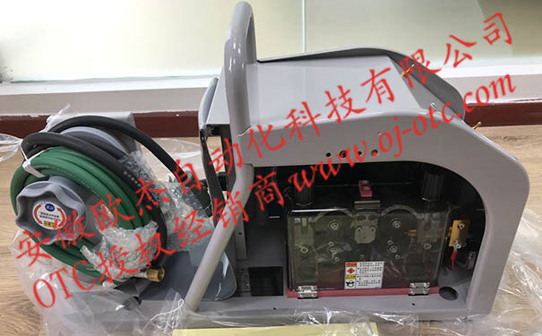 OTC DAIHEN CM-7402 wire feeder side view