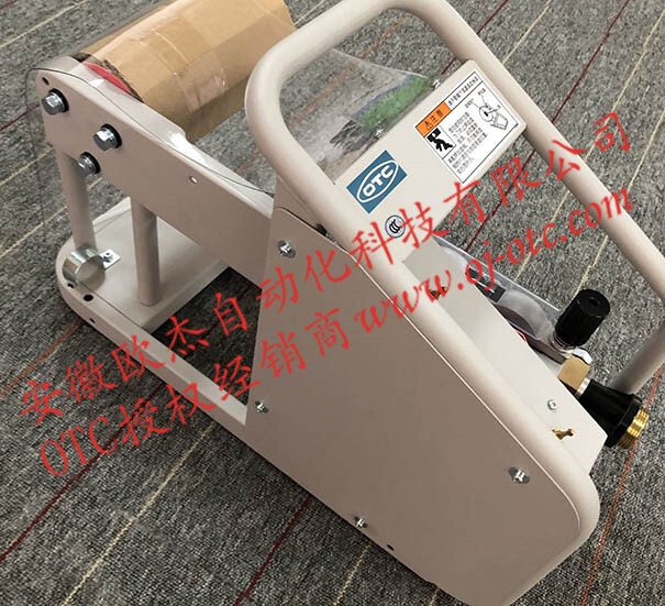 OTC DAIHEN CME-6401 wire feeder side view with feed mechanism