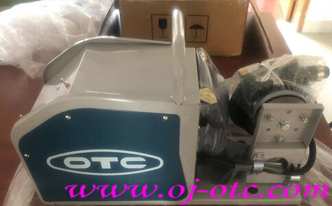 OTC DAIHEN CMV-7402 wire feeder side view with connectors